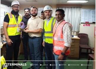 The master of the Green Ace receiving a memento to commemorate its first call into Hamad Port, Qatar