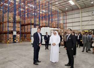 Abdulla Bin Damithan, CEO & Managing Director of DP World UAE & JAFZA, being shown around the new Boxcoworld logistics facility