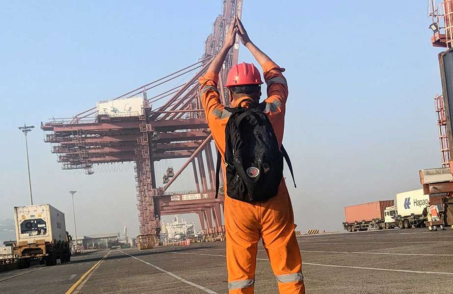 APM Terminals Mumbai An APM Terminals Mumbai worker bidding farewell to one of the older container cranes, now being decommissioned