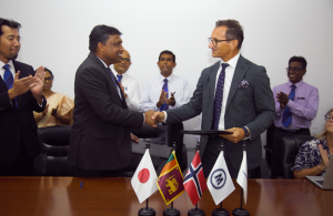 Roald Misje, Chairman of Misje, and Thimira S. Godakumbura, Managing Director and Chief Executive of Colombo Dockyard, exchanging delivery protocols for the Misje Viola