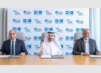 MOL Group Senior Managing Executive Officer, Ajay Singh; DP World COO of Parks and Zones, Abdulla Al Hashmi; and INDU Kishore Logistics, Chairman, Kishore Lakhani, at the joint venture signing ceremony