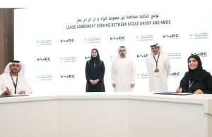 The signing of the lease agreement between KEZAD and NMDC