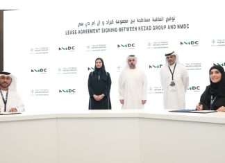 The signing of the lease agreement between KEZAD and NMDC