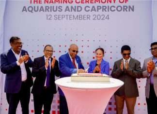 Stakeholders celebrate the arrival of two new tugs at Colombo port, which will operated by Sri Lanka Shipping