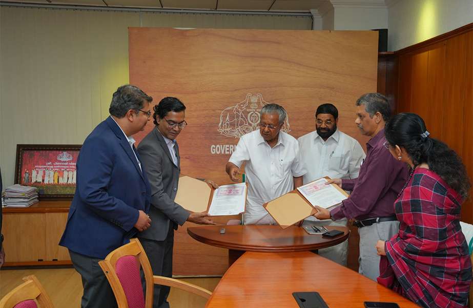 Representatives of the Kerala government and Adani Vizhinjam signing the revised concession agreement