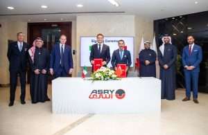 Executives from ASRY signing two key agreements with Italian companies