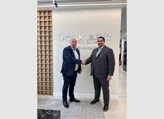 Richard Jacobsen, Sales Director EMEA Maritime at Orbcomm (left), and Mohamed Badawi, Chief Operating Officer of Folk Maritime (right), shake hands on the new partnership