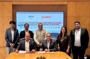 The signing of the agreement between APSEZ and SAMRX for the development of an automotive port facility at Dighi Port