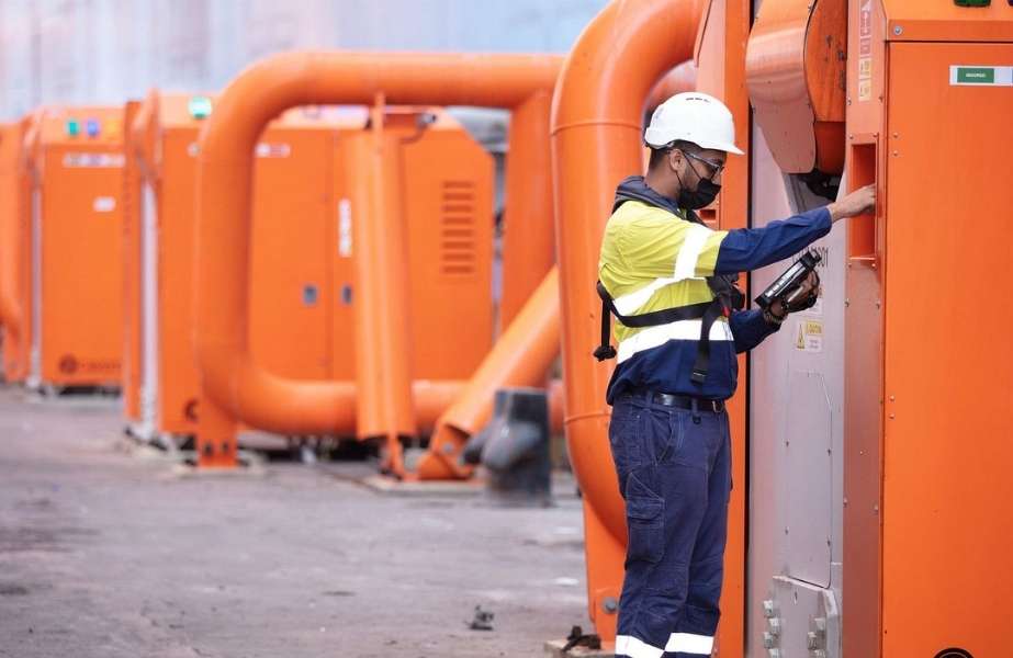 A Cavotec engineer working on one of the Port of Salalah’s MoorMaster units