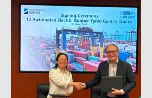 The signing ceremony for the new automated electric RTG cranes