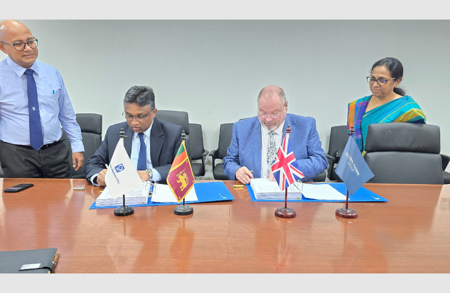 Story-13-1 Thimira Godakumbura, Managing Director and CEO of CDPLC, and Simon Hibberd, CEO of Global Marine Systems Limited, signing the shipbuilding contract in Colombo