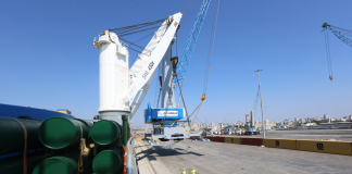 One of the new mobile harbour cranes being offloaded at the port of Tartous in Syria